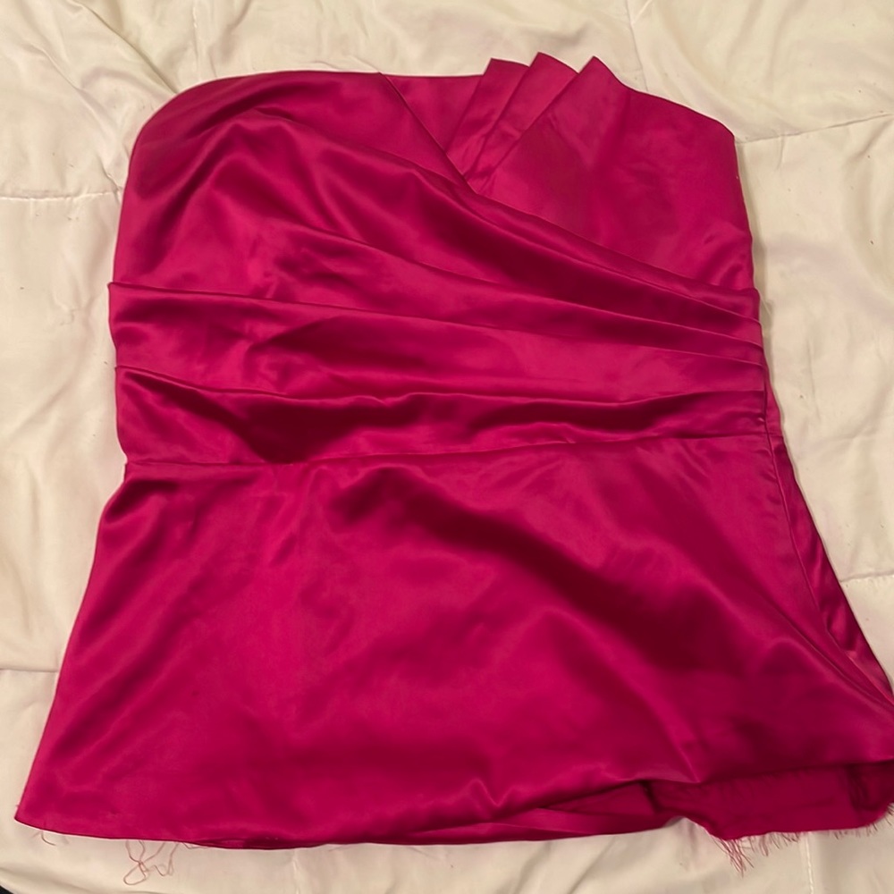 Hot pink limited strapless top.